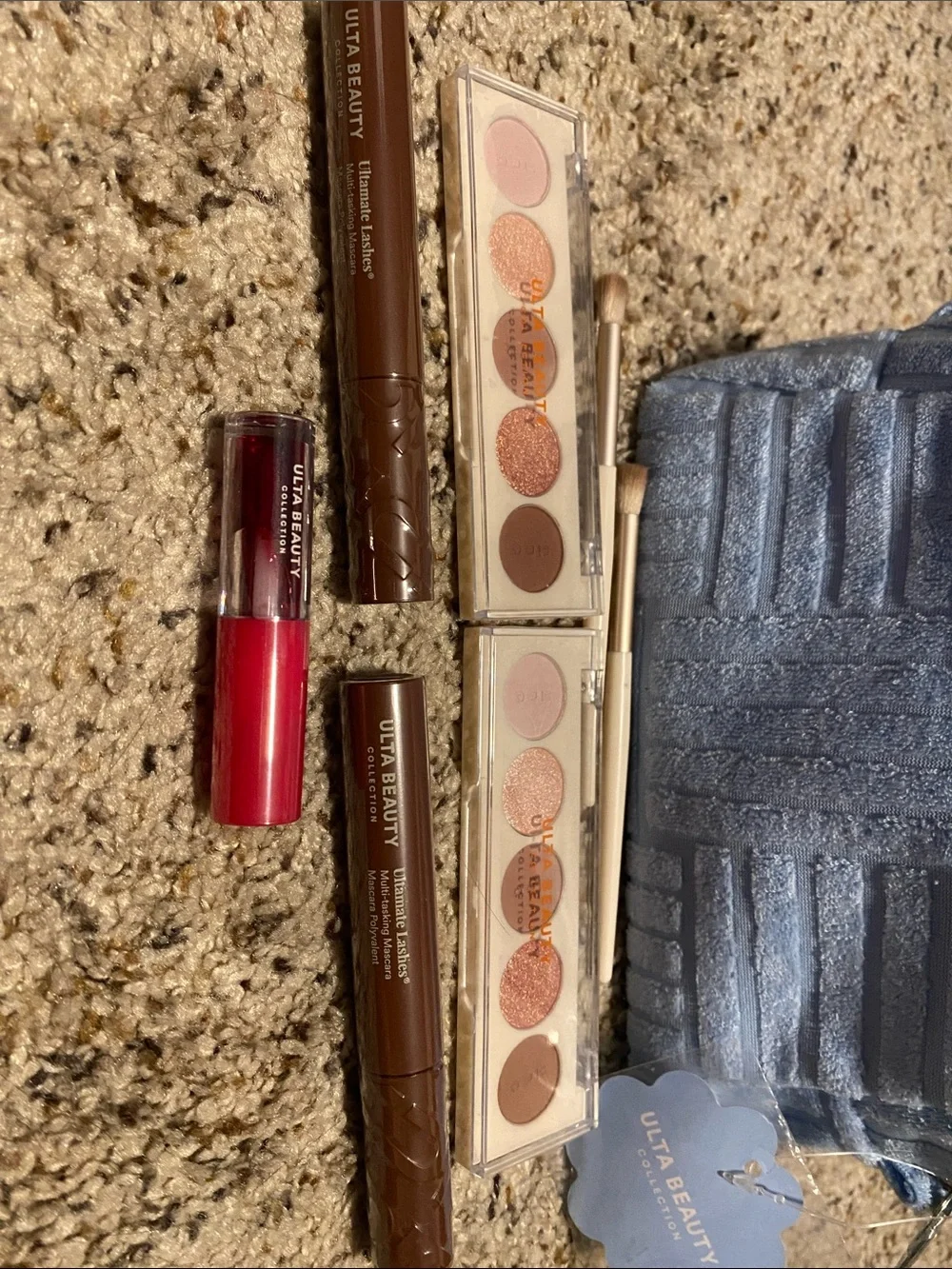 Ulta Beauty Light Blue Terry Textured Cosmetic Case with eye makeup